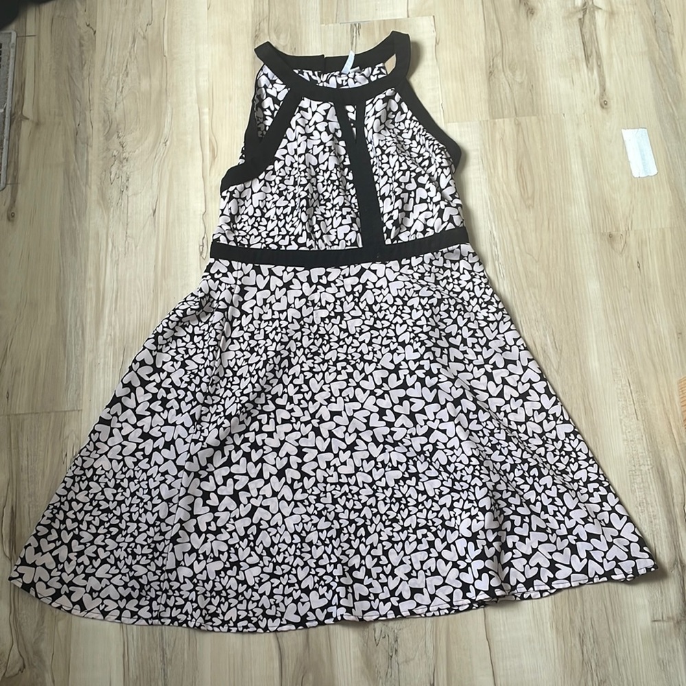 New never warned without tag, Black and white heart dress in size 10.